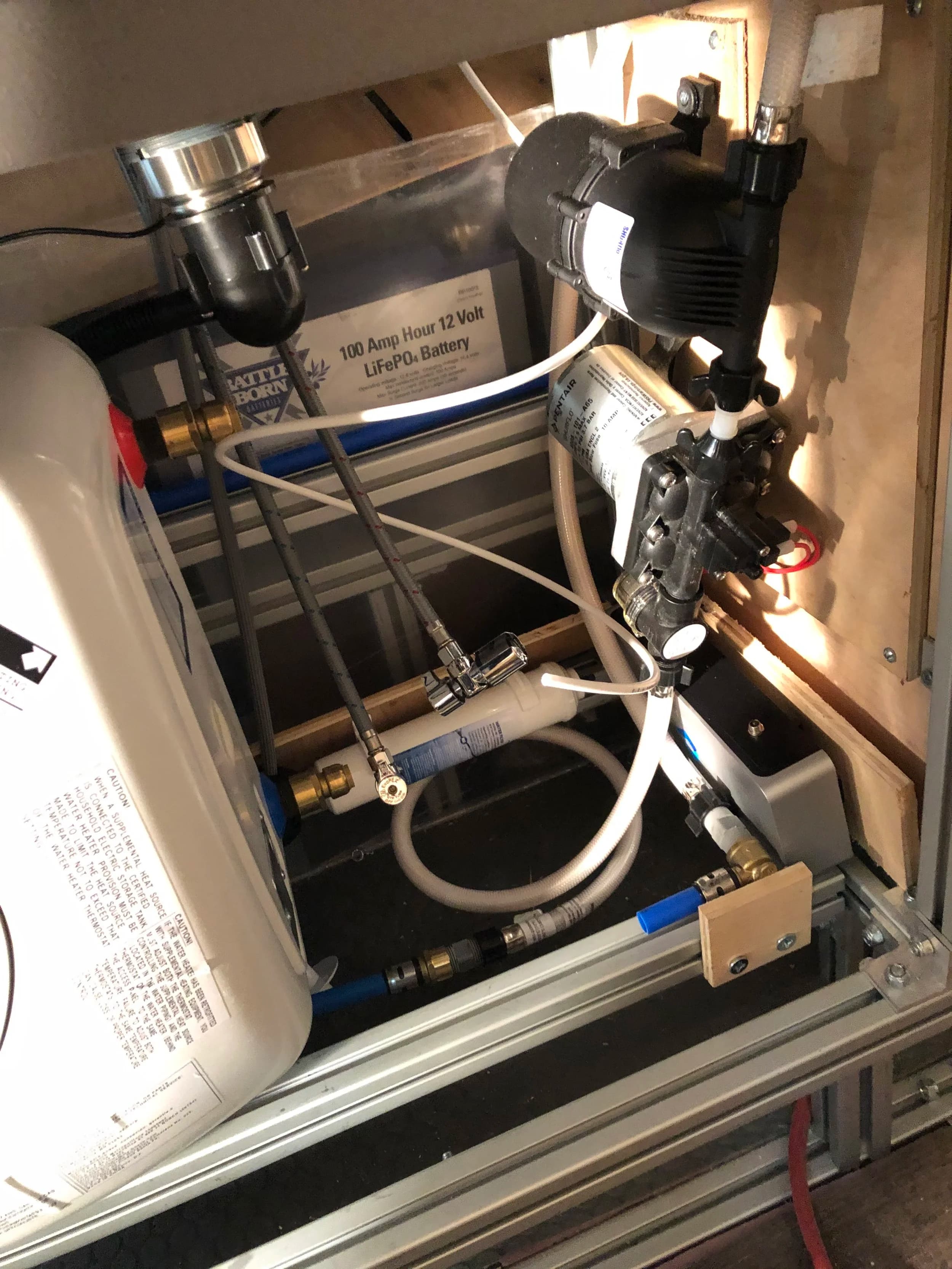 Fresh water plumbing system with heater and pump